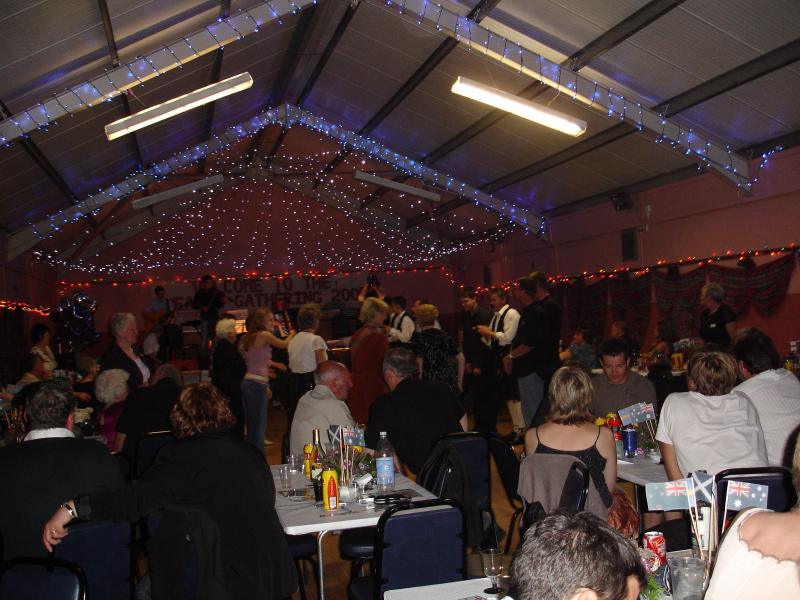 Photo: Members of the Shearer Family doing the Strip the Willow at the Ceilidh