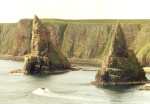 Explorer Going Into Duncansby Stacks - from above